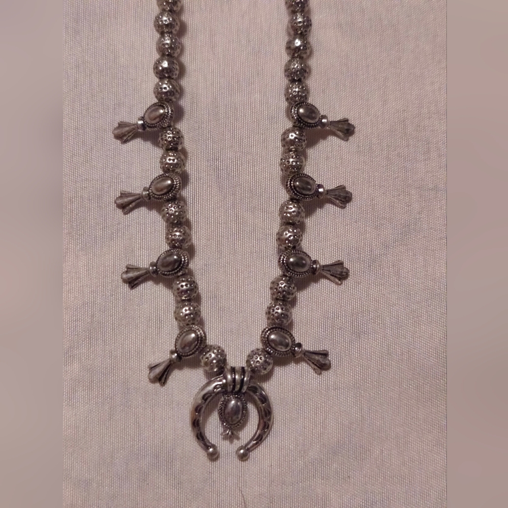 Chic Silver Beaded Necklace with Unique Charms